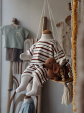 Load image into Gallery viewer, Rust stripe romper on baby mannequin – styled in boutique window display