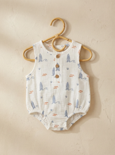 Load image into Gallery viewer, White organic cotton muslin romper with surf print hanging on wooden hanger