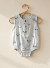 Load image into Gallery viewer, Organic cotton muslin romper with whale print hanging on wooden hanger
