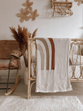 Load image into Gallery viewer, striped knit baby blanket hanging from crib side – organic look