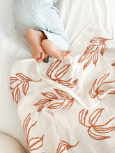 Load image into Gallery viewer, Organic Muslin & Bamboo Baby Swaddle – Large Leaves Autumn Print (120x120 cm)