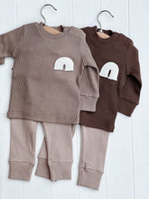 Load image into Gallery viewer, flat lay of beige and brown ribbed baby sets on a white surface