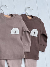 Load image into Gallery viewer, close-up of ribbed cotton baby set laid flat – rainbow detail