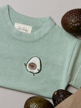 Load image into Gallery viewer, top-down view of folded avocado baby t-shirt – playful summer outfit
