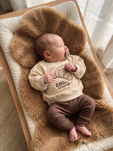 Load image into Gallery viewer, Baby wearing cream organic cotton sweatshirt with textured croissant embroidery and Little Crumb slogan
