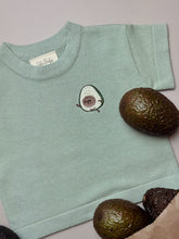 Load image into Gallery viewer, close-up of avocado embroidery on sage green cotton tee – fun kidswear detail
