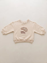 Load image into Gallery viewer, Cream organic cotton baby and toddler sweatshirt with croissant embroidery and Little Crumb slogan
