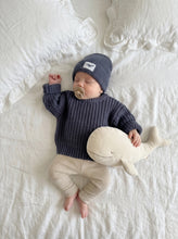 Load image into Gallery viewer, Sleeping baby wearing Ada Baby dusty blue oversized chunky knit jumper styled with matching knit leggings and whale plush on white linen bedding.
