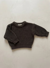 Load image into Gallery viewer, Flat lay of an oversized chunky knit baby jumper in khaki made from 100% cotton featuring a chunky textured knit and ribbed detailing.

