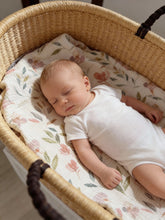 Load image into Gallery viewer, Sleeping newborn on a floral organic cotton muslin baby blanket with pink flower print
